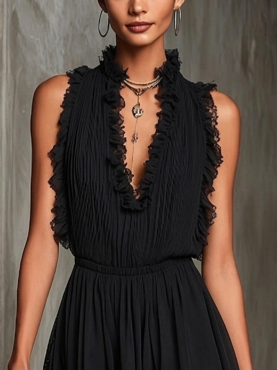 Melaine | Mini mono con volantes negros | Blanca Vela