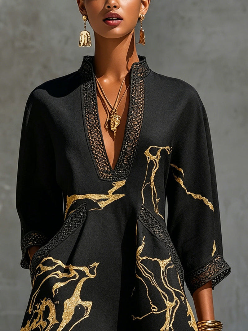 Ebony |Vestido de cuello en V mini, estampado negro y dorado | Blanca Vela
